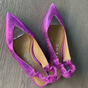 Pink metallic flats.